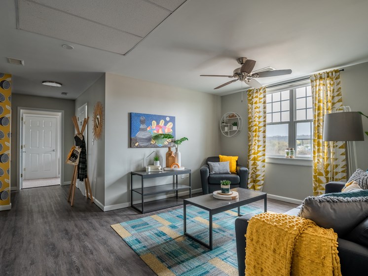 Living Room at Spinner Place's Winooski, VT Apartments